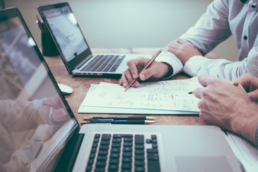 People using laptops to search for work and skills careers advice