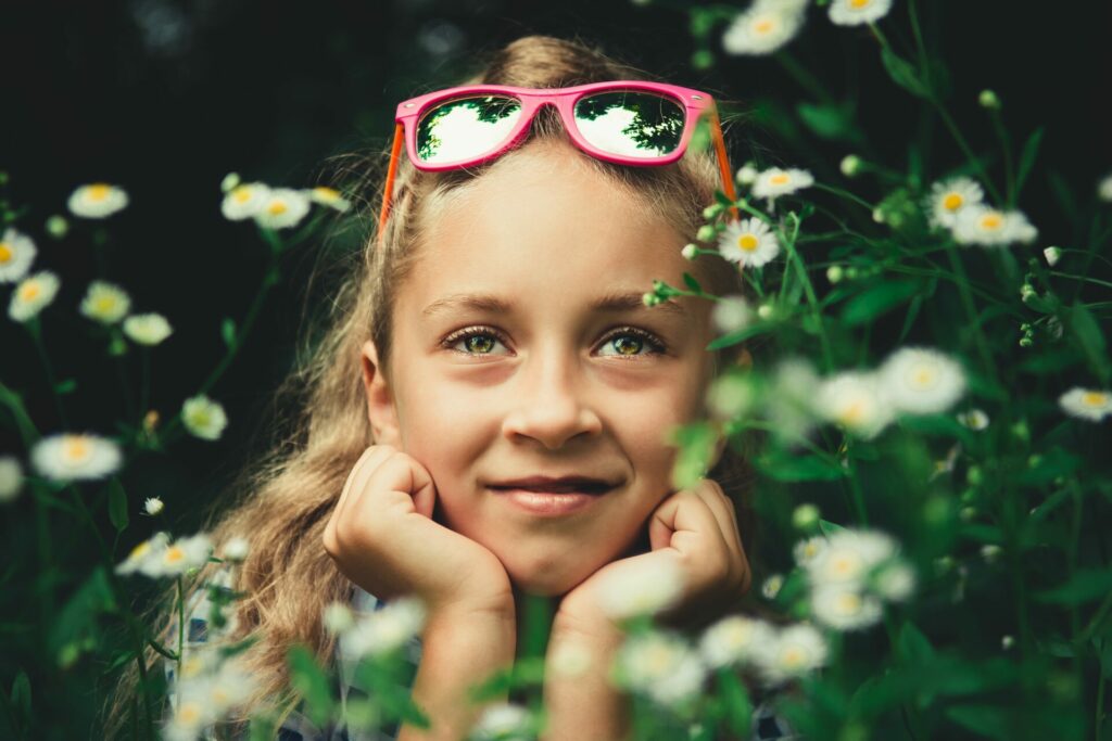 Decorative: young girl dreaming with chin in hands
