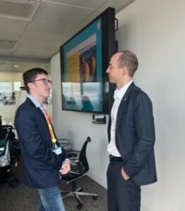 Student talking to member of Barclays staff