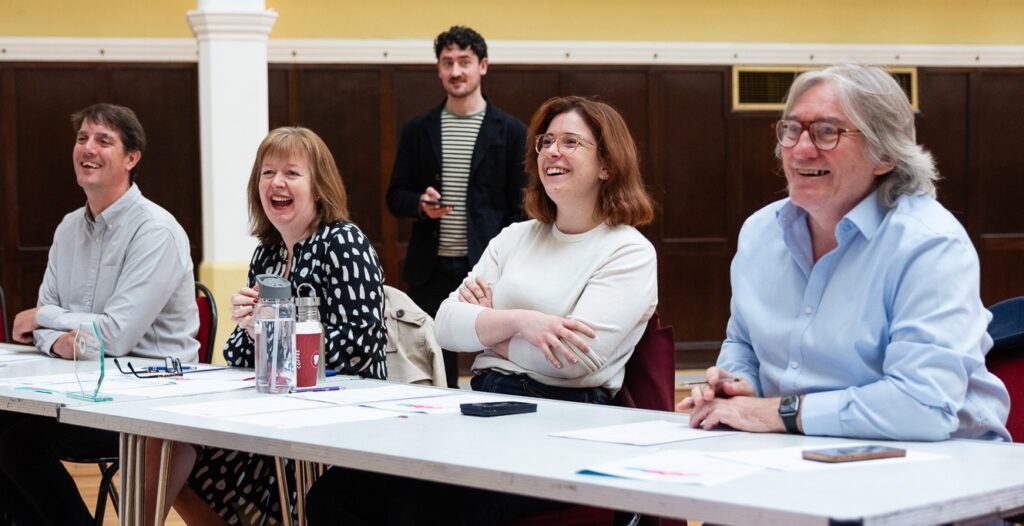 Friendly Dragons smiling and enjoying presentations: Colin Stewart from London Borough of Redbridge, Sarah Murray from Local London, Griff Tanner from Cirrus Logic, and Sofia Paci from BGF